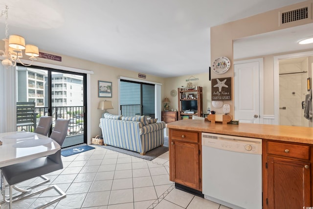 5905 S Kings Hwy Unit 219-B, Myrtle Beach, SC 29575 - kitchen featuring dishwasher, a chandelier, brown cabinets, light tile patterned floors, and light countertops
