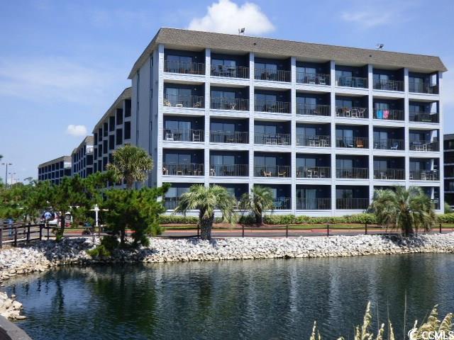 5905 S Kings Hwy Unit 219-B, Myrtle Beach, SC 29575 - view of apartment building / complex featuring a water view