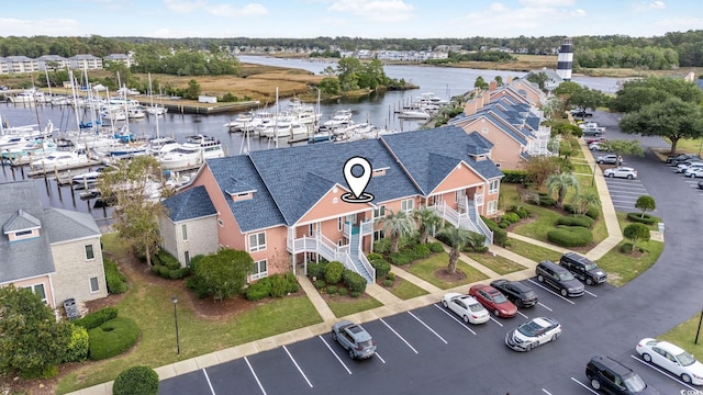 drone / aerial view featuring a water view