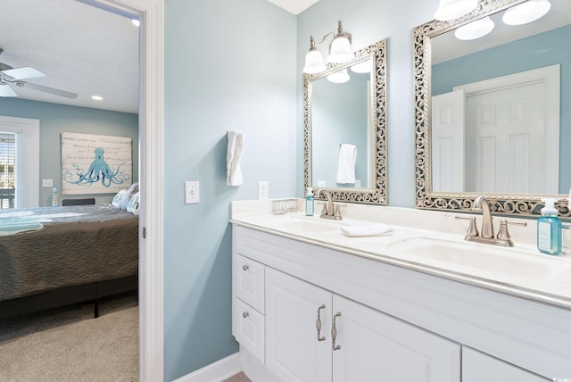 bathroom featuring vanity and ceiling fan