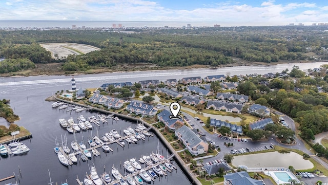 birds eye view of property featuring a water view