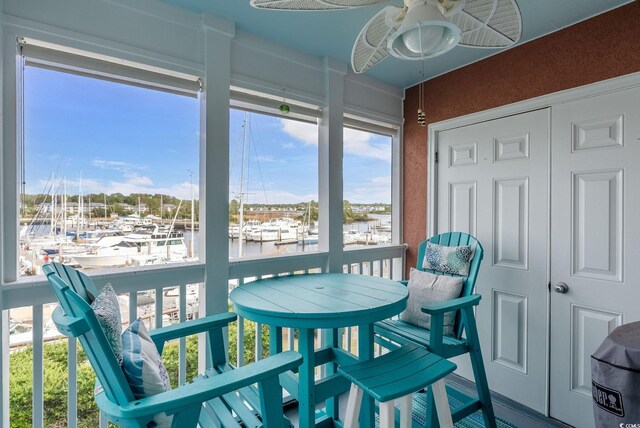4755 Lightkeepers Way Unit 15-F, Little River, SC 29566 - sunroom featuring view of marina and a water view