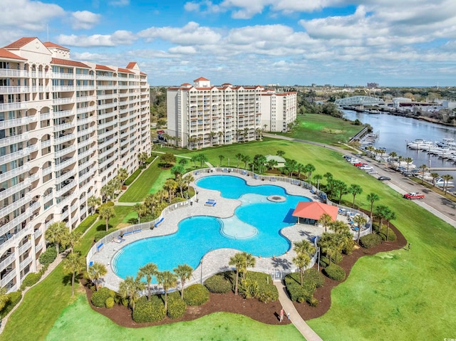 drone / aerial view with a water view