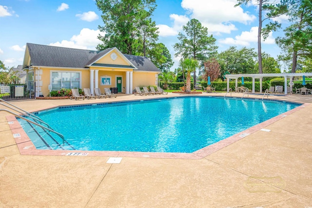 view of swimming pool with a patio