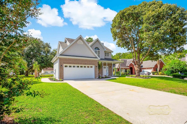 view of front of house featuring a garage and a front lawn