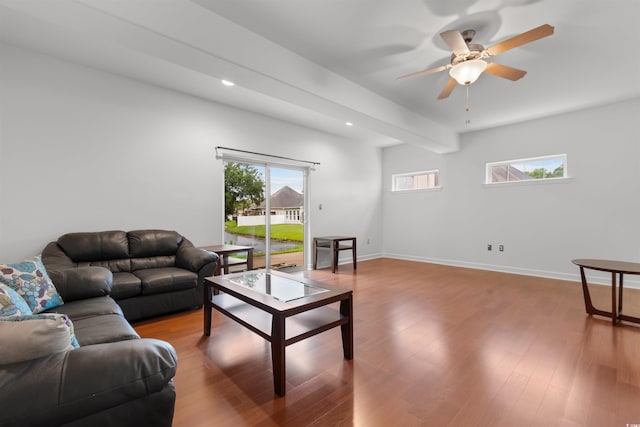 living room with ceiling fan and hardwood / wood-style floors