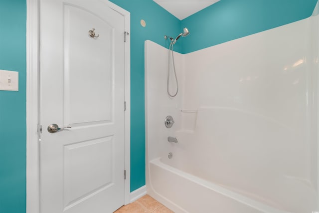 full bath featuring bathtub / shower combination and tile patterned flooring