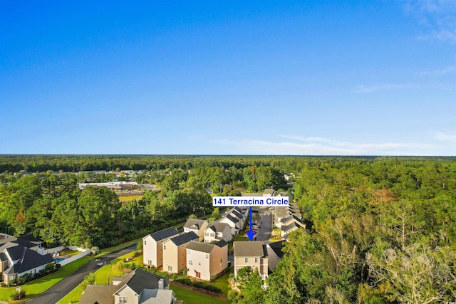 bird's eye view with a residential view and a view of trees