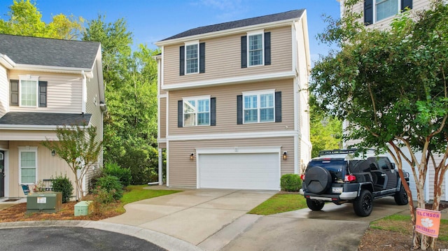 view of front of home with a garage and central air condition unit