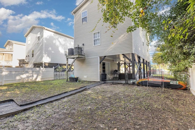 back of property featuring a patio area