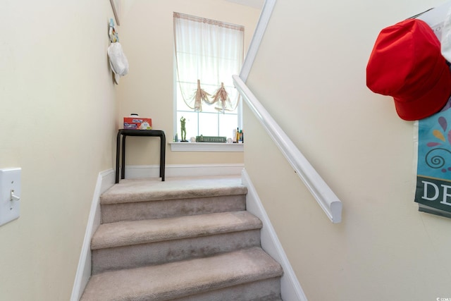 stairway with baseboards