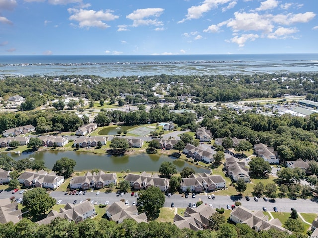 bird's eye view featuring a residential view and a water view