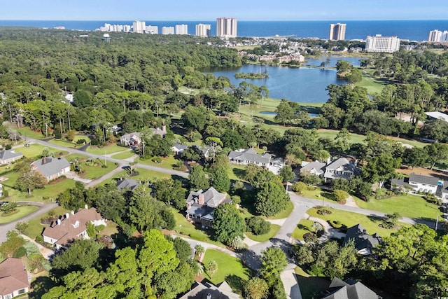 birds eye view of property featuring a water view