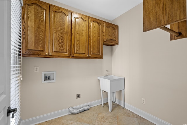 laundry area with cabinets, washer hookup, and electric dryer hookup