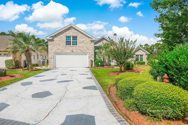 view of front of property featuring a garage