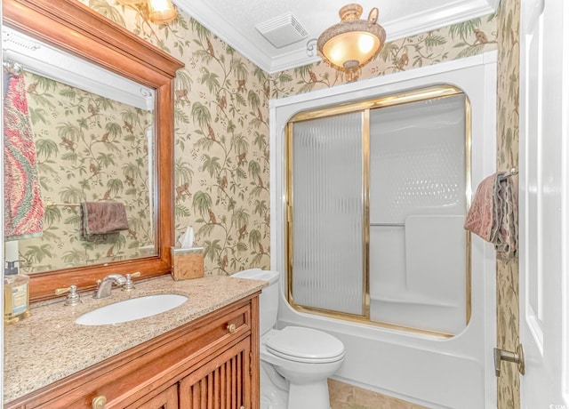 full bathroom with vanity, toilet, a textured ceiling, crown molding, and combined bath / shower with glass door