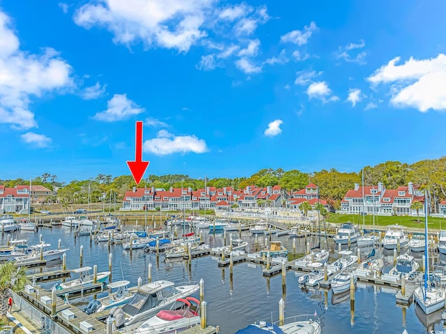 dock area featuring a water view