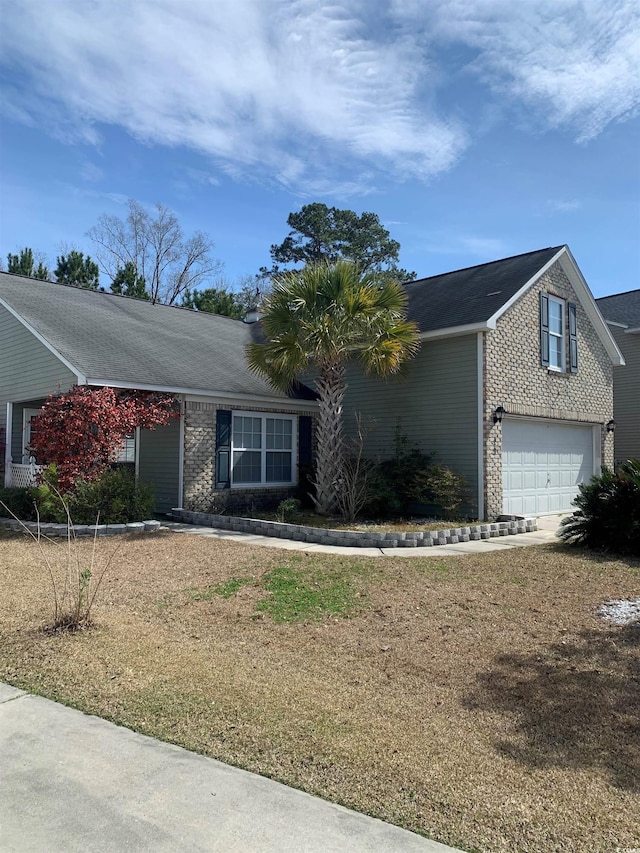 ranch-style home with a garage