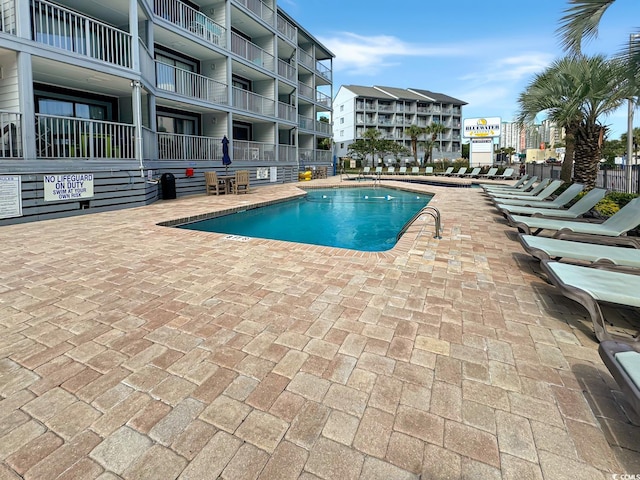 view of pool with a patio