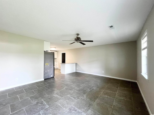 empty room with ceiling fan