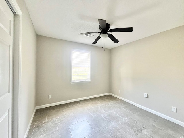 empty room with ceiling fan