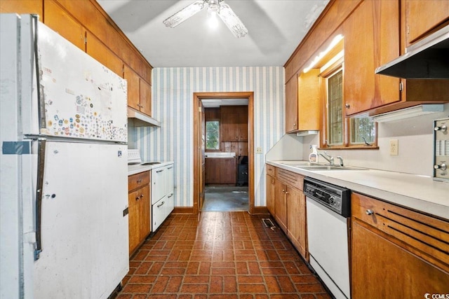 kitchen with ceiling fan, sink, and white appliances