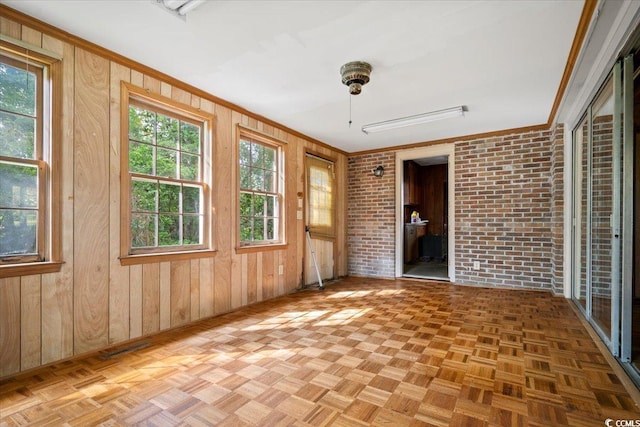 unfurnished sunroom with a wealth of natural light