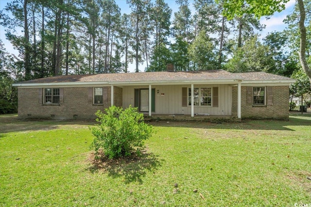 ranch-style house featuring a front yard