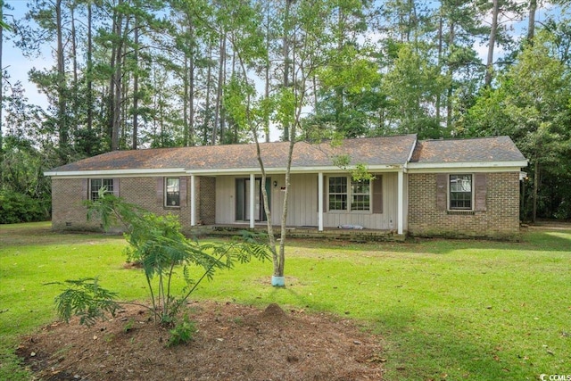 ranch-style house with a front lawn