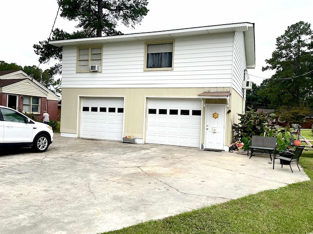 exterior space featuring a garage and cooling unit