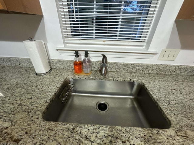 2108 Kirkland Dr, Conway, SC 29526 - details featuring light stone counters and a sink