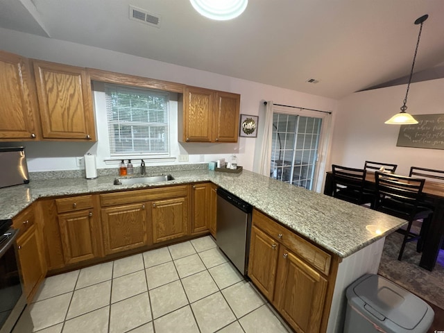 2108 Kirkland Dr, Conway, SC 29526 - kitchen featuring brown cabinets, a sink, stainless steel appliances, visible vents, and vaulted ceiling
