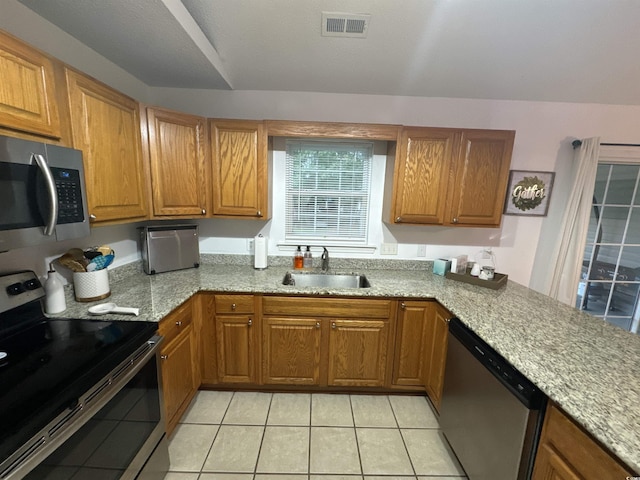 2108 Kirkland Dr, Conway, SC 29526 - kitchen featuring light tile patterned flooring, stainless steel appliances, visible vents, and a sink