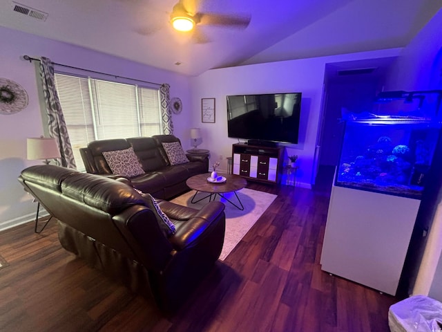 living room featuring wood-type flooring, ceiling fan, and vaulted ceiling