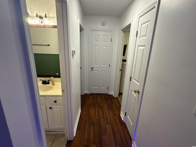 2108 Kirkland Dr, Conway, SC 29526 - hallway featuring a sink and dark wood-style floors