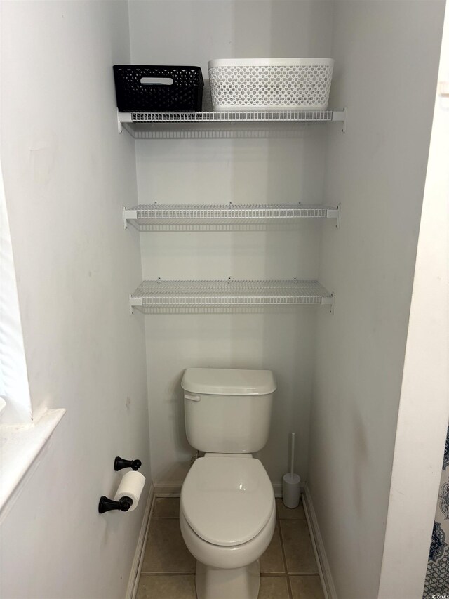 2108 Kirkland Dr, Conway, SC 29526 - bathroom with toilet, tile patterned flooring, and baseboards