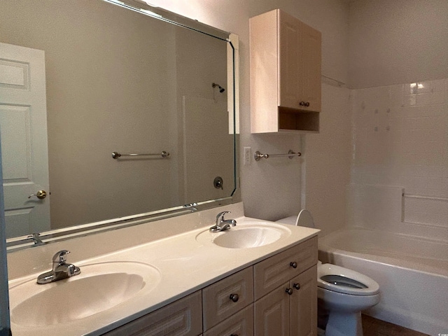 full bathroom featuring  shower combination, vanity, and toilet