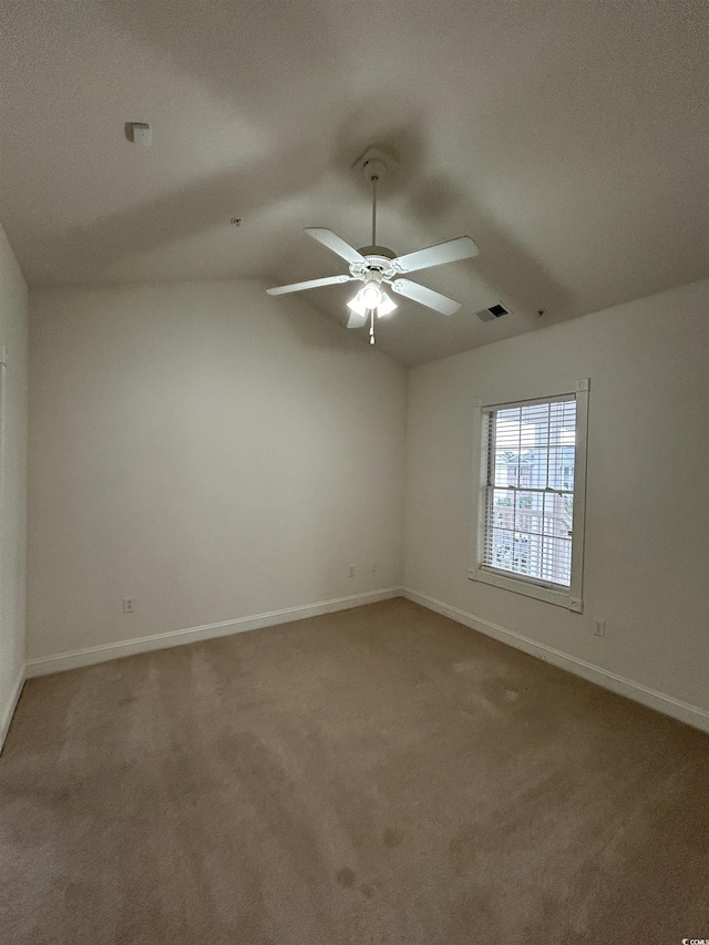 4870 Luster Leaf Cir Unit 401, Myrtle Beach, SC 29577 - unfurnished room featuring carpet flooring, a ceiling fan, baseboards, and vaulted ceiling