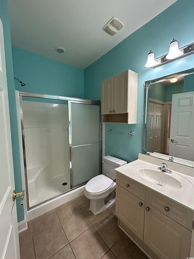 4870 Luster Leaf Cir Unit 401, Myrtle Beach, SC 29577 - full bath featuring a stall shower, tile patterned floors, vanity, and toilet