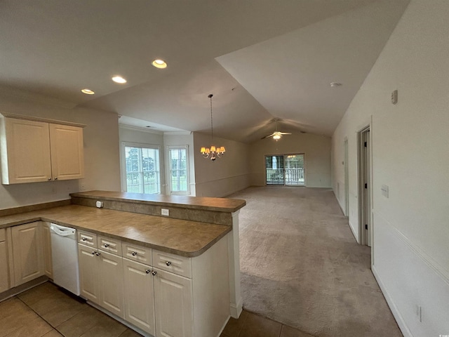 4870 Luster Leaf Cir Unit 401, Myrtle Beach, SC 29577 - kitchen featuring white dishwasher, a peninsula, open floor plan, a chandelier, and light carpet