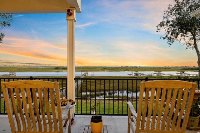 1324 Harbour Watch SW, Calabash, NC 28467 - balcony at dusk with a water view
