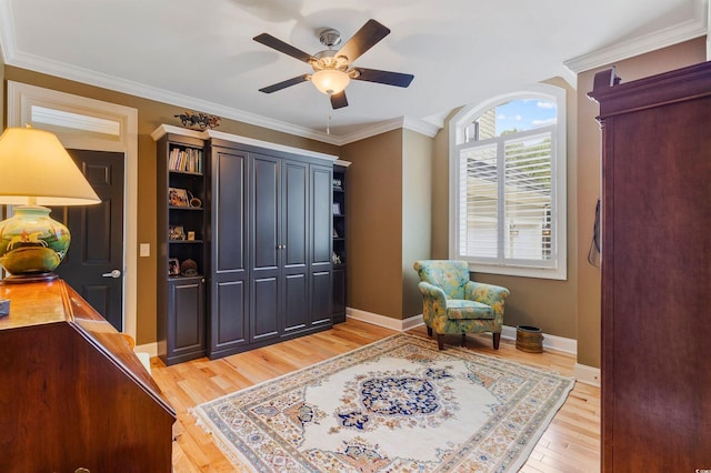 1324 Harbour Watch SW, Calabash, NC 28467 - sitting room featuring light wood-type flooring, a ceiling fan, ornamental molding, and baseboards