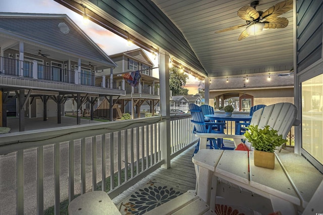 view of balcony at dusk