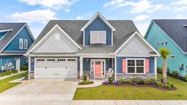 craftsman inspired home featuring a front yard and covered porch