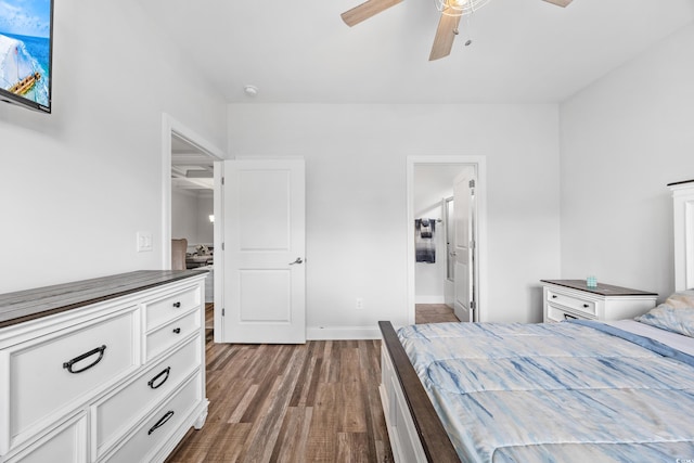 unfurnished bedroom with hardwood / wood-style flooring, ceiling fan, and ensuite bathroom