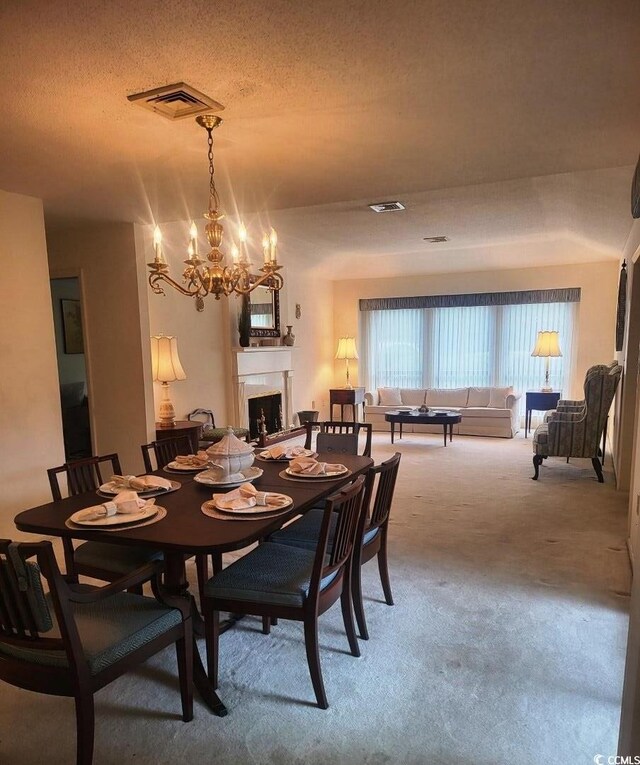 living room featuring a textured ceiling and carpet