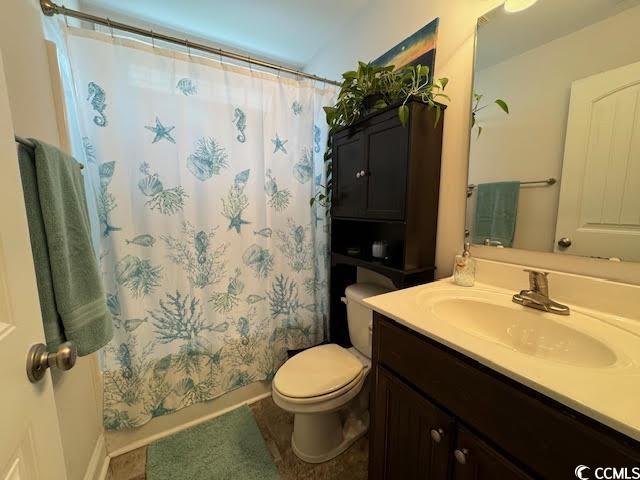 bathroom with vanity and toilet