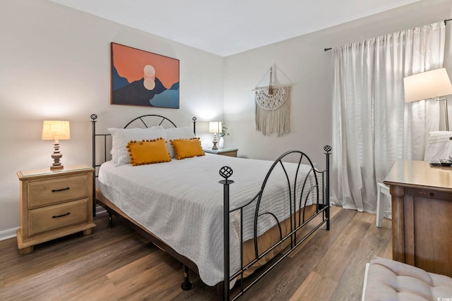 bedroom featuring hardwood / wood-style floors