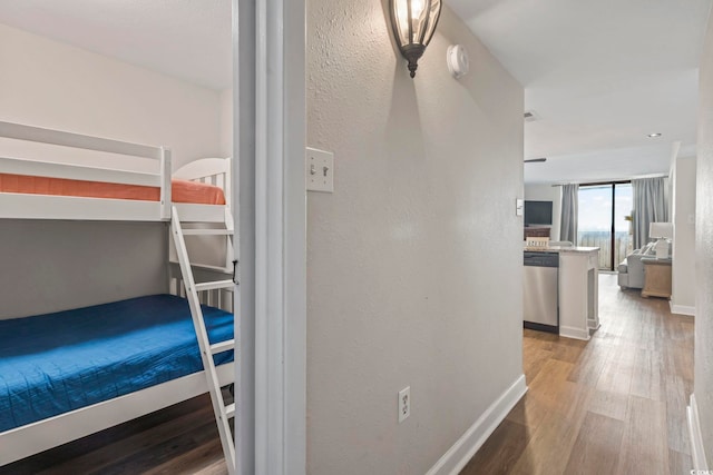 bedroom with wood-type flooring