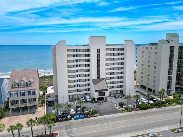 view of property with a water view